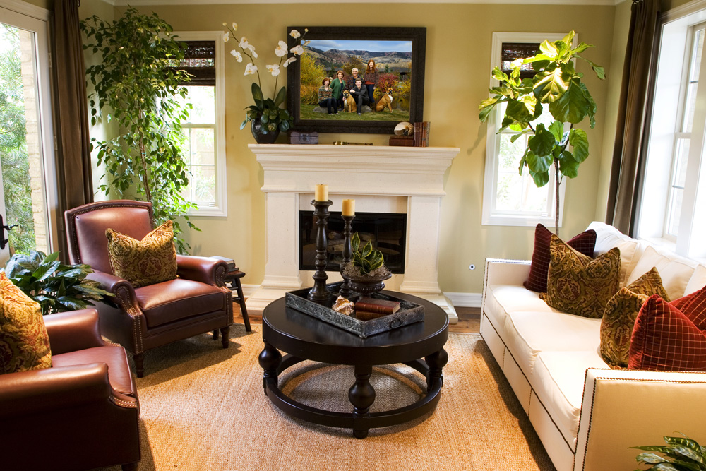 Family Portrait Artwork in the Home family portrait artwork displayed about the fireplace in a client's home