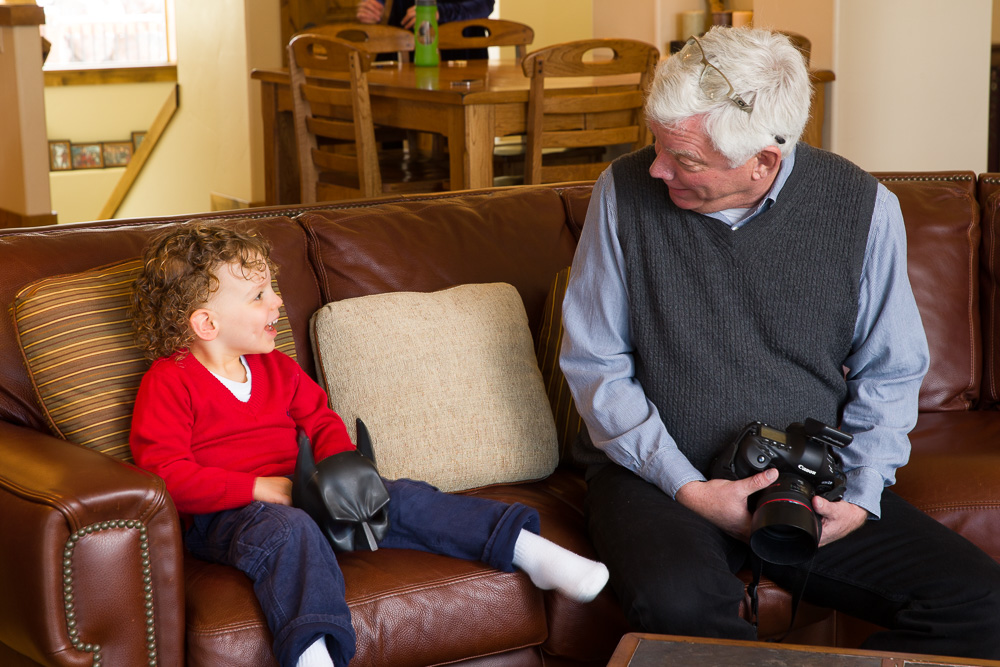 Dennis Walsh During a Family Portrait Session Dennis Walsh working with a child during a family portrait session