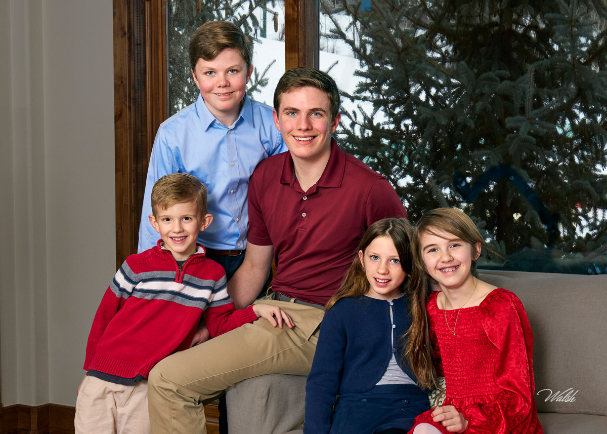 Five grandchildren photographed together during an in-home family portrait session