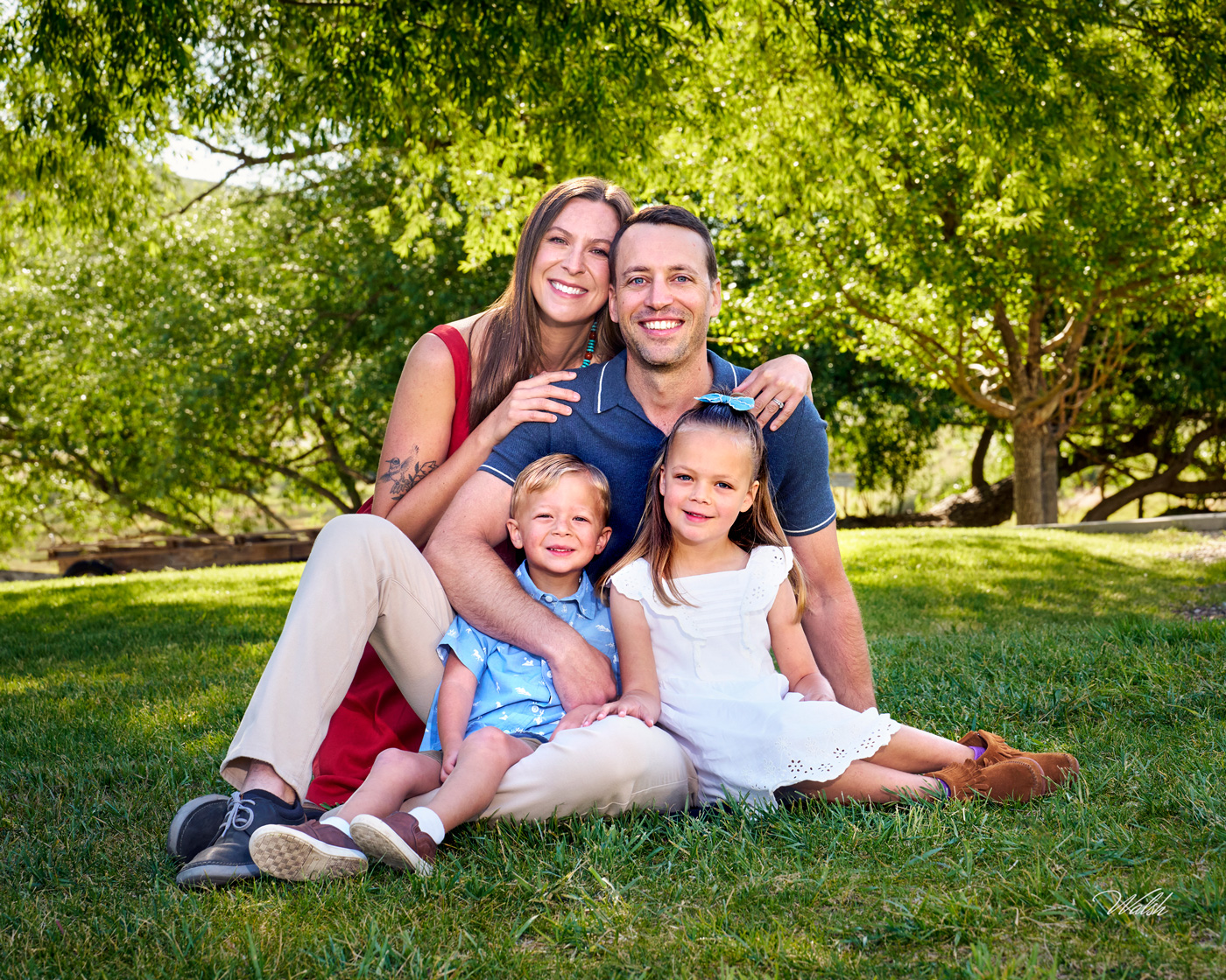 park-city-family-photography-young-family-1400 Parents with their two young children during an outdoor family portrait session in Park City