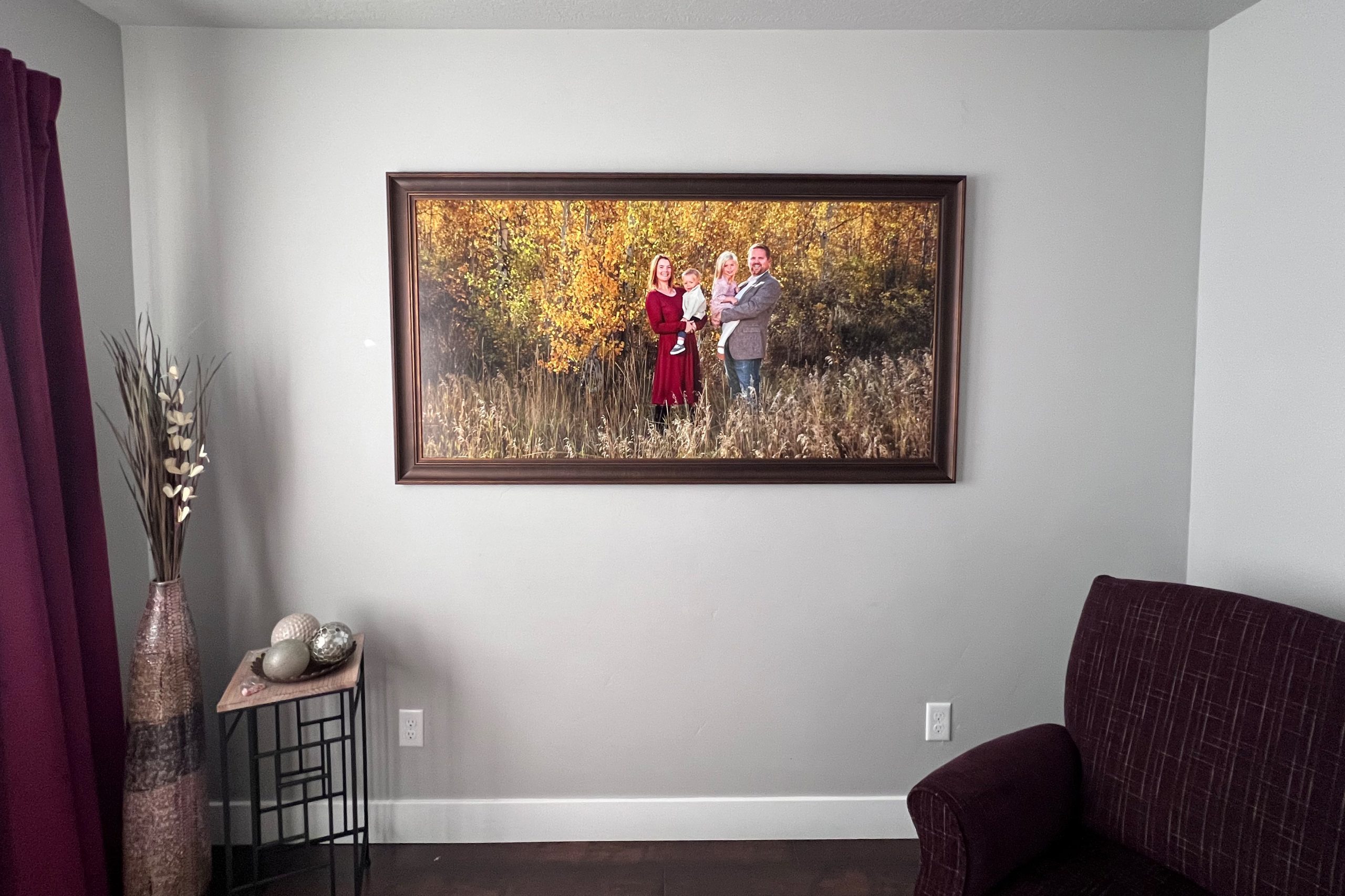 park-city-family-wall-portrait-home Framed fall family portrait displayed in a client's home